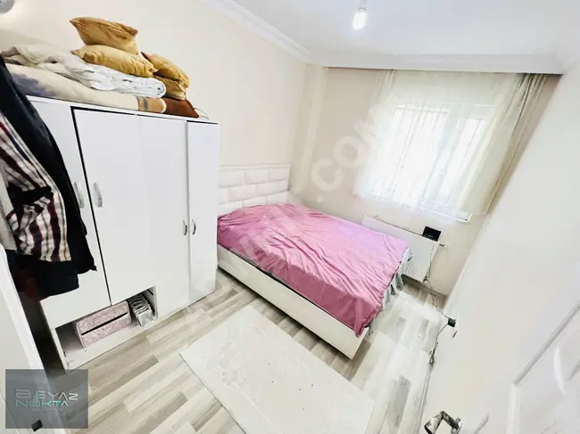 An efficient and suitable 2+1 apartment near the main street from BEYAZNOKTA