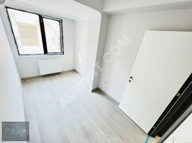 A spacious 3+1 apartment with a master bathroom and a new middle floor occupancy permit | from BEYAZNOKTA