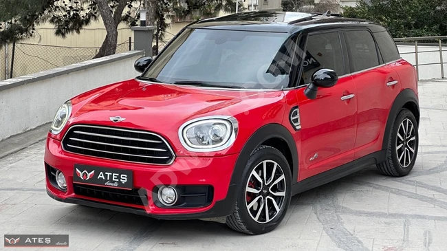 Mini Cooper Countryman ALL4 with a panoramic roof, electric tailgate, heating, and rearview suitable for financing