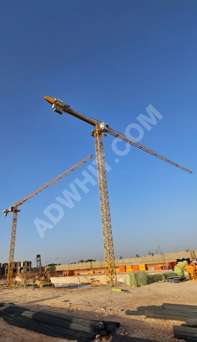 Urgent: Tower crane (6518) for sale, 8 ton capacity, free height 50 meters, arm length 65 meters