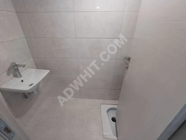 3+1 apartment in BEŞTELSİZ EVLERi TOKI complex, equipped with an elevator, 135 square meters, sixth floor, for sale - Osmanli Real Estate