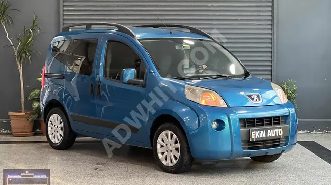 2011 Peugeot Bipper, a blue car equipped with a rearview camera, steel rims, Bluetooth, double sliding door, and extra comfort