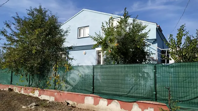 For sale, a detached two-story house with a garden on a plot of 300 square meters, from OSMANLI Real Estate Office