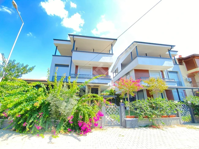 For sale: luxurious 3+1 villa with a full sea view, located 50 meters from Ürkmez beach