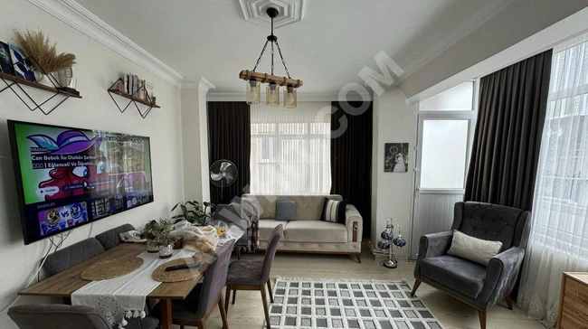 2+1 apartment on the middle floor with a balcony for sale in POLİGON by NET GYD