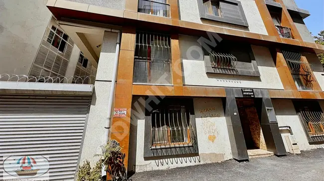 2+1 apartment on the ground floor - facing ÖZGÜR Street - modern building with closed parking