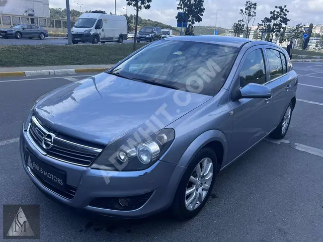 سيارة Opel Astra 1.3 CDTI Essentia موديل 2011 أوتوماتيك بدون تغييرات مع صيانة بالوكالة