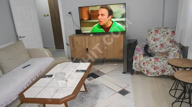 2+1 apartment with an area of 80 square meters on the basement floor with central heating in Bayrampaşa Altıntepsi