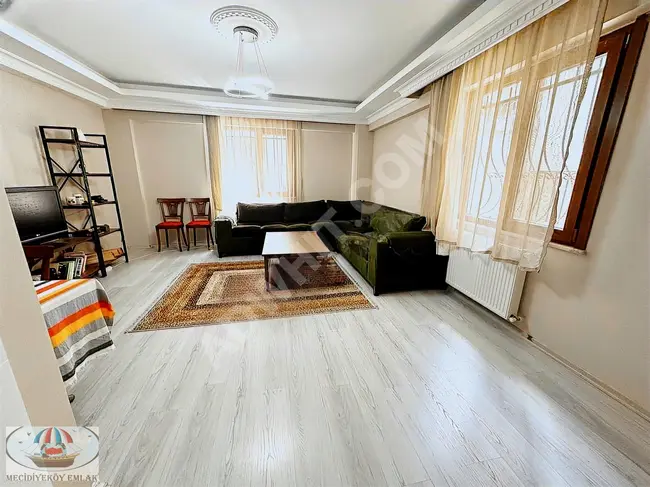 2+1 apartment on the ground floor - facing ÖZGÜR Street - modern building with closed parking