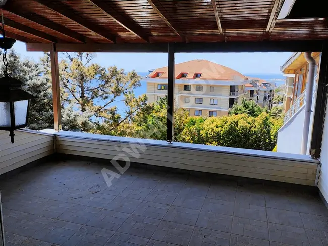 Triple-level villa for sale with a sea view in a residential complex in SİNANOBA