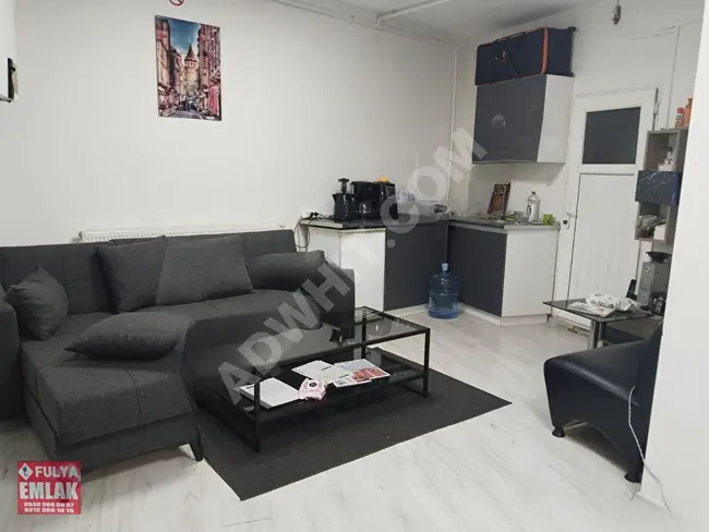 70 square meter area suitable for use as a storage or office currently rented. Advertisement by FULYA EMLAK real estate