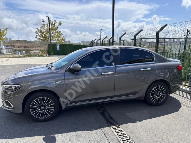 The owner of the FIAT EGEA 1.4 EASY PLUS 100.YIL car without defects, without paint, with additions