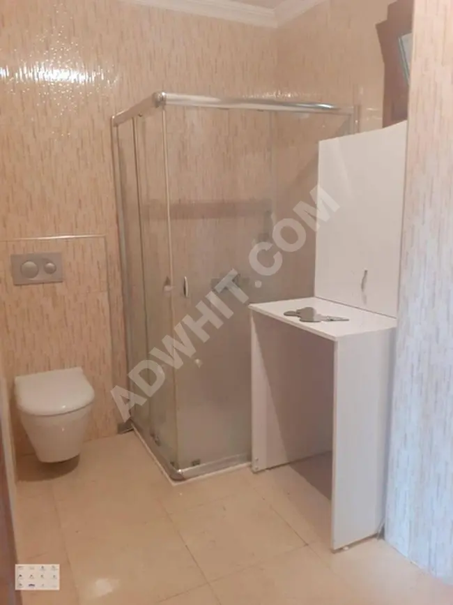 For sale: 1+1 apartment suitable for a loan in a new building with parking, elevator, and a separate kitchen, just 10 steps from ORTAKLAR Street