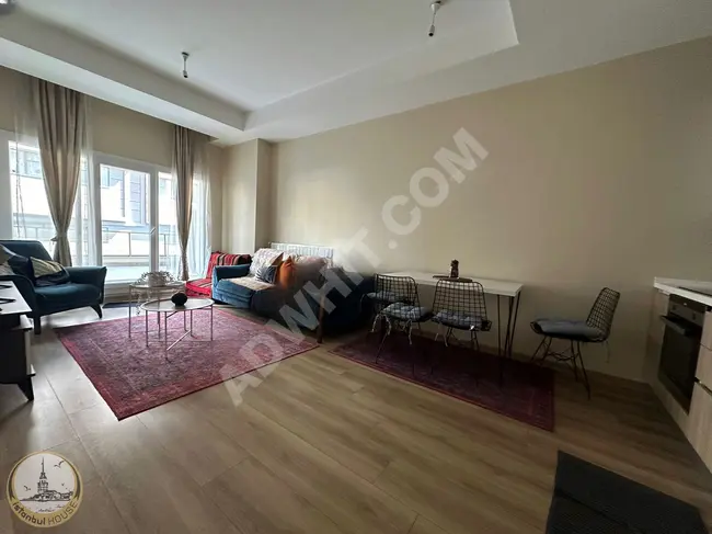 1+1 furnished apartment with a terrace and balcony in BAĞCILAR