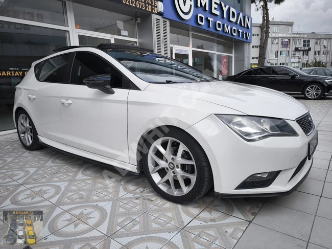 From SARIAY - 2014 Seat Leon with a 1.6 TDI engine and a glass roof, having covered 142,000 km