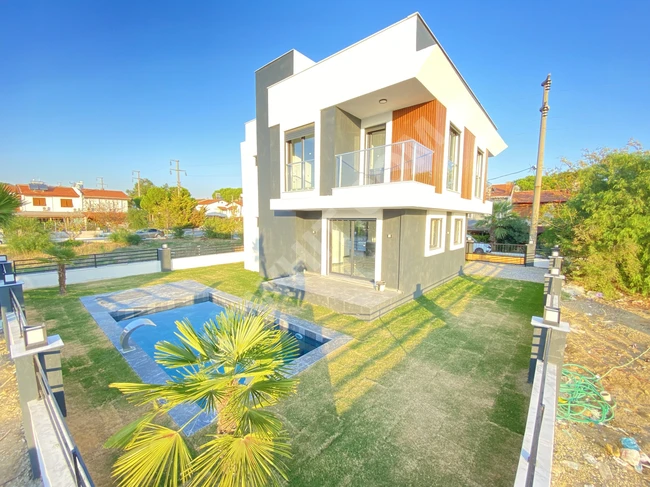 Detached villa 4+1 with a swimming pool, full sea view for sale in Sığacık