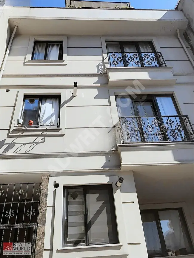 Spacious and functional duplex in a low-rise building