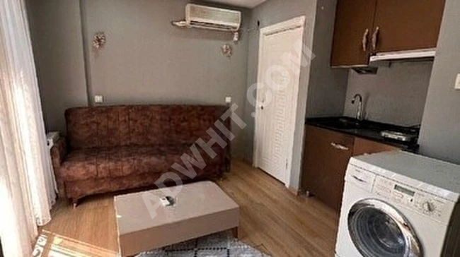 Emlak center'dan Historia arkası 1+1 eşyalı kiralık daire