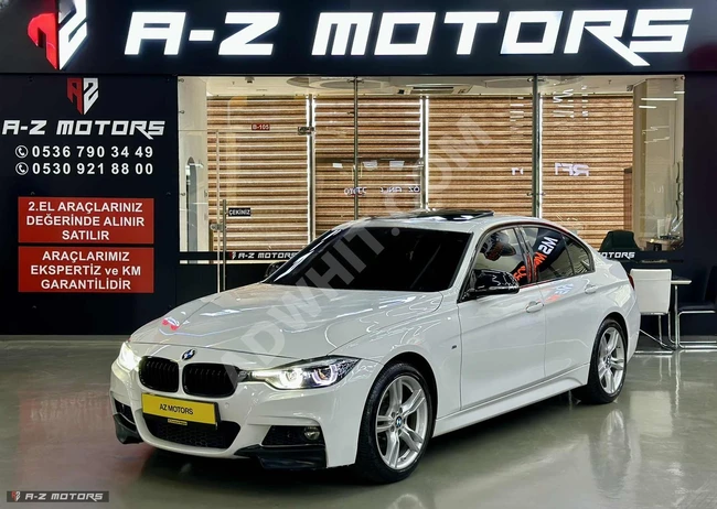 2018 BMW 3.18i model, M Sport category, red interior. Advertisement presented by A-Z MOTORS