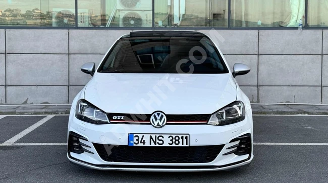 Volkswagen Golf 1.4 TSI Highline with a glass roof, rims, and Coil suspension system