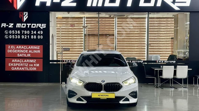 BMW 216D car model 2021, maintained at BORUSAN, without any accidents from A-Z MOTORS