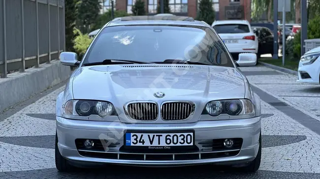 سيارة للبيع BMW 318Ci موديل 2002 بقوة 150 حصان بدون مصاريف وبحالة مثالية