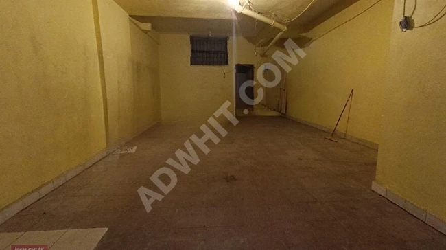 Commercial space for rent with a bathroom, featuring an automatic door for opening and closing in the Yeşilova area