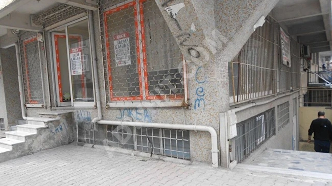 A shop on the street corner with a bathroom and a kitchen from irem emlak