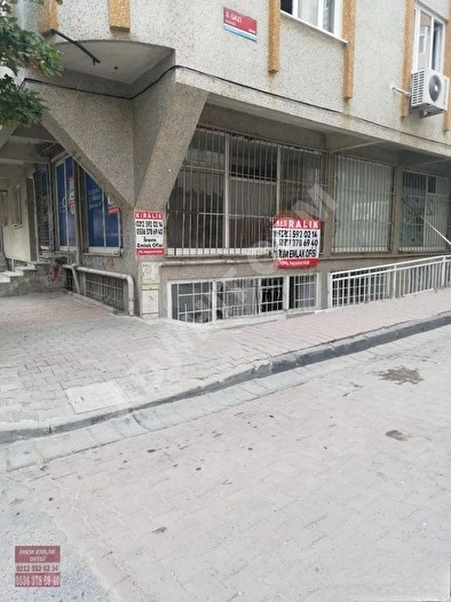 A shop on the street corner with a bathroom and a kitchen from irem emlak