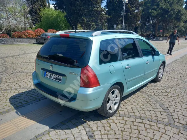 2004 Peugeot 307 car, LPG gasoline, glass roof, automatic, available on installment and exchange