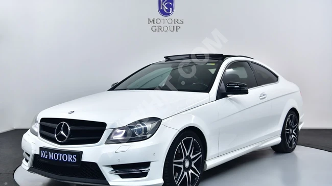 2015 مرسيدس بنز C180 AMG بلس 7G-ترونيك كوبيه  سقف زجاجي بانورامي تشغيل بدون مفتاح