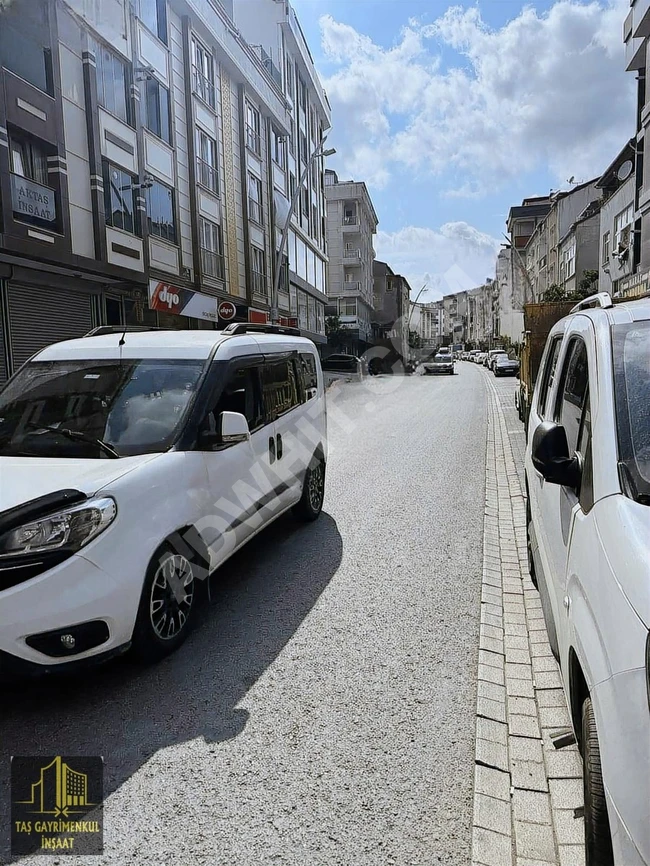 Independent building on the main street containing 4 apartments and 3 shops in the center of ARNAVUTKÖY