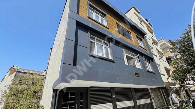 Independent building on the main street containing 4 apartments and 3 shops in the center of ARNAVUTKÖY