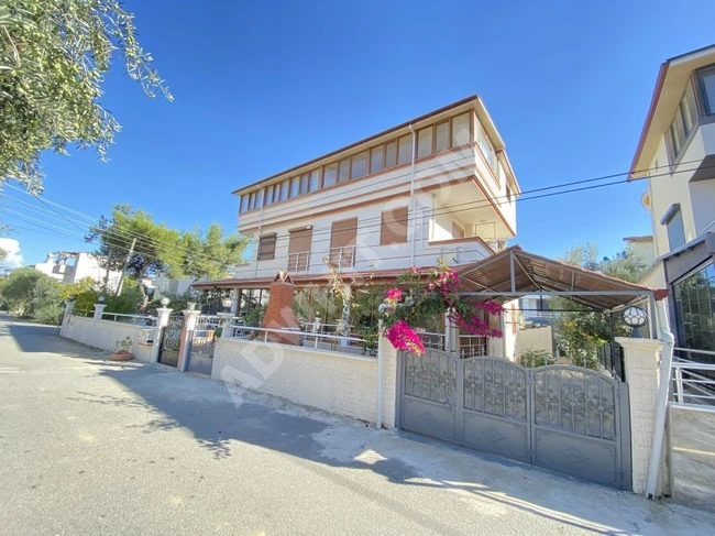 **Villa 3+1 for sale in Doğanbey, near the sea with a closed parking space**