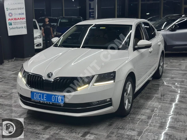 From DİCLE OTO Skoda Octavia 2017 MDL 2.79 Full Loan Support & Exchange