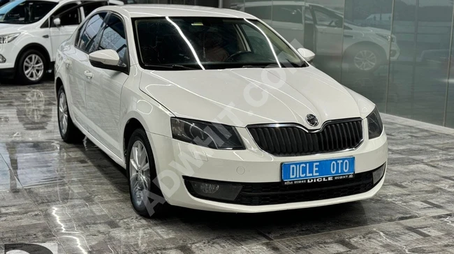 Model 2015 Skoda Octavia 2.99, full loan and exchange available from DİCLE OTO