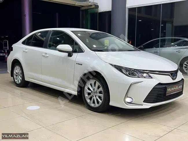 YILMAZLAR**87 BİNDE 2021 MODEL**HYBRID COROLLA ŞERİT TKP CARPLAY