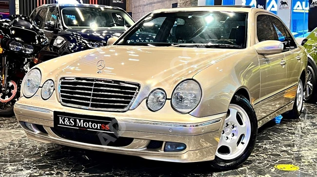 Mercedes E200 AVANTGARDE model 2001 - E2 package with cooling, heating, memory, and COMAND screen