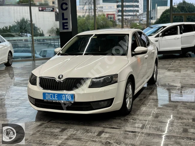 Model 2015 Skoda Octavia 2.99, full loan and exchange available from DİCLE OTO