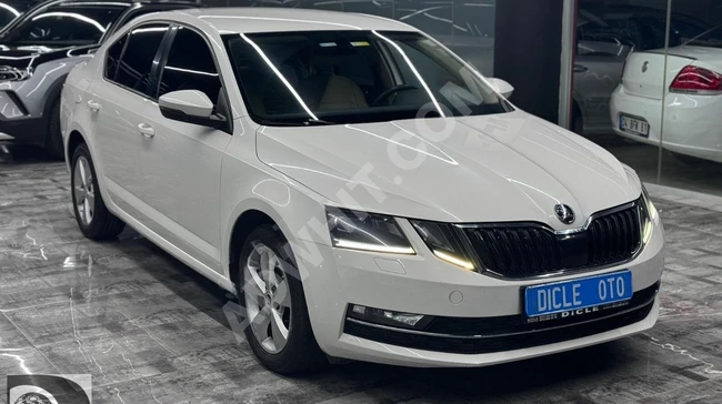 From DİCLE OTO Skoda Octavia 2017 MDL 2.79 Full Loan Support & Exchange