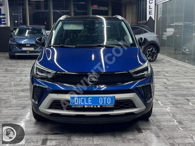 From DİCLE OTO Opel Cross 2022 with a glass roof, full loan at 2.79 interest and an opportunity for trade-in