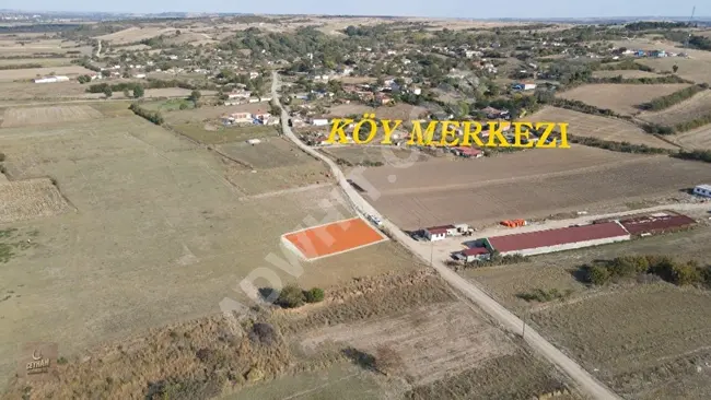 In the village of Uzunköprü Muhacırkadı, a plot of land with an area of 213 m² is located on an elevated site near the village