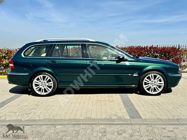 جاكوار X-TYPE استيت 2005 3.0 V6 AWD لونBRITISHGREEN + تجديد كامل