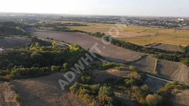 In the village of Uzunköprü Muhacırkadı, a land area of 418 m² at a high location near the village