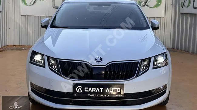 2019 سكودا أوكتافيا  ستايل DSG بحالة صيانة ممتازة من CARAT AUTO