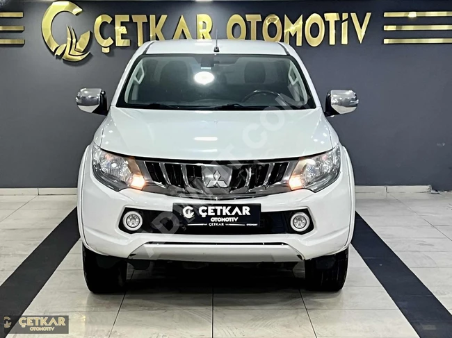 From ÇETKAR: Mitsubishi L200 4x4 automatic, car without parts replacement, with invoice