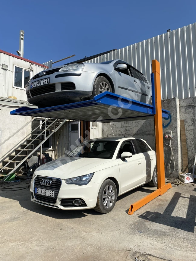 Hydraulic lift for a two-story garage