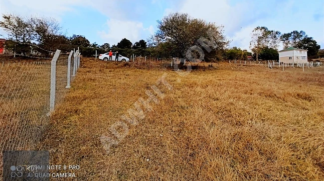 A plot of land measuring 360 m² for sale within the village in the ÇATALCA HİSARBEYLİ district with a building permit