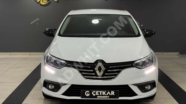 Renault Megane 1.6 Joy car equipped with a rear display screen, Tesla screen with Icon system from ÇETKAR 2017