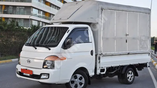 Hyundai H 100 truck model 2018 opens from 3 sides with a canopy